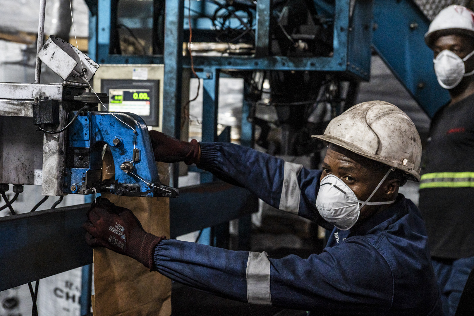 industrial process photography with machinery and sparks